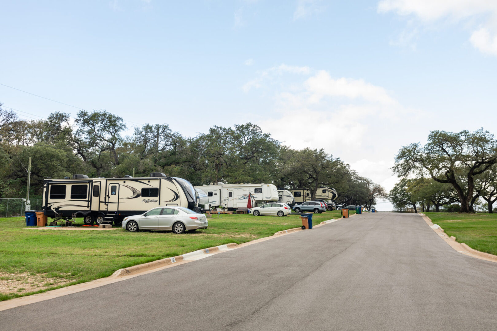 movie houses and cars on a field