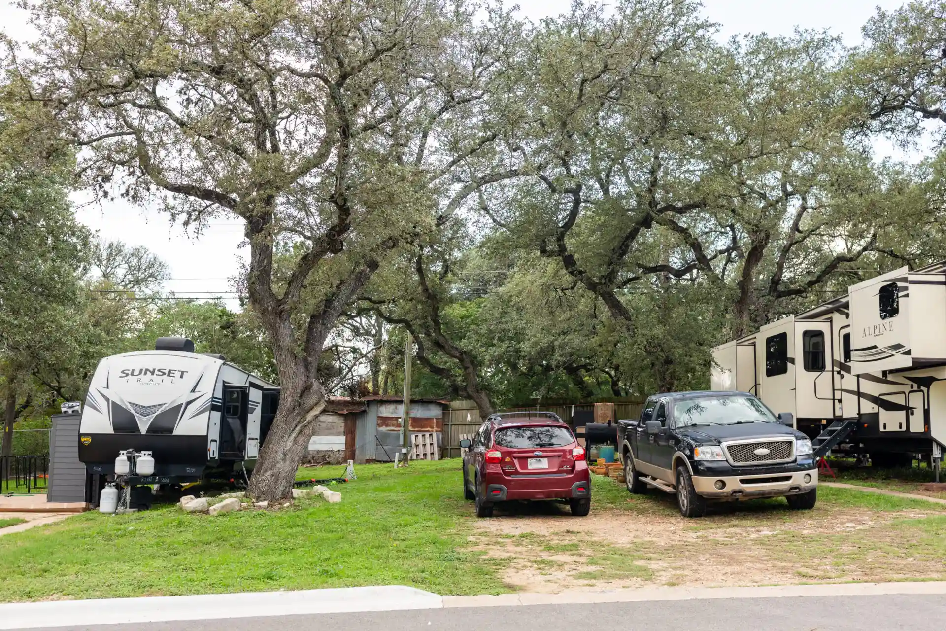 two cars and the Sunset RV Van